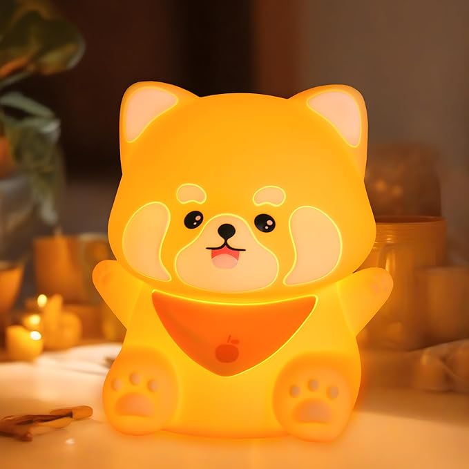 A cute red panda-shaped night light on top of a living room table.